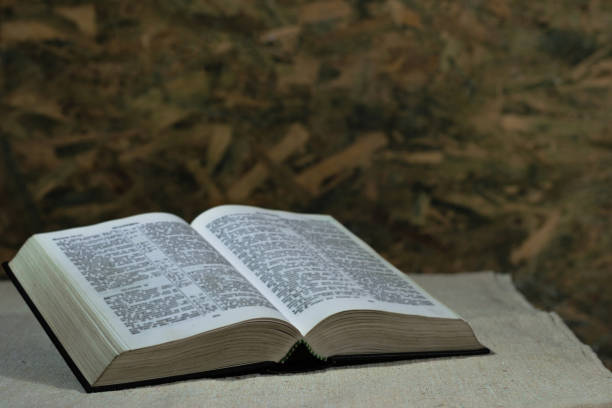 istock Bible on an old table. Beautiful background. Religion concept. 1053234536