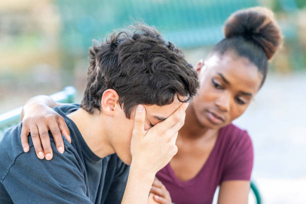 Diverse young couple, he is very stressed