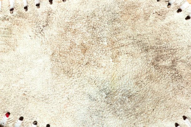Grungy leather texture of a used baseball stock photo