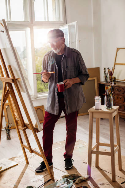istock Senior adult painter 1053257942