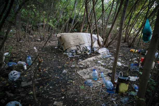 istock Homeless doweling. Small habitation, tent made from garbage 1053258294