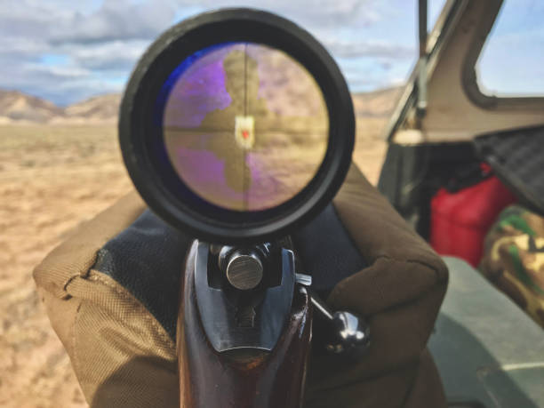 Sighting in a 30-06 Big Game Hunting Rofle with High Powered Scope Target Practice Looking Through with Cross Hairs on Target - shot with iPhone 7 Plus