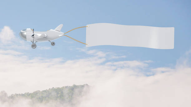 istock Airplane model white color with empty banner mock-up 1053307492