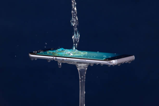 istock Mobile phone water resistant. Test waterproof mobile phone 1053308978