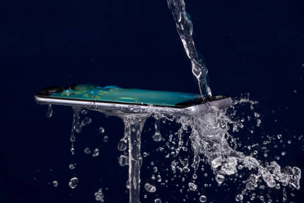 istock Mobile phone water resistant. Test waterproof mobile phone 1053309004