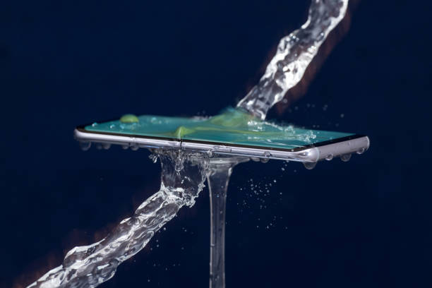istock Mobile phone water resistant. Test waterproof mobile phone 1053309048