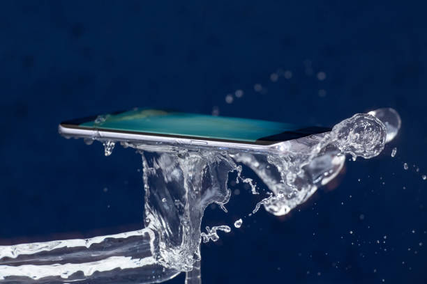istock Mobile phone water resistant. Test waterproof mobile phone 1053309080