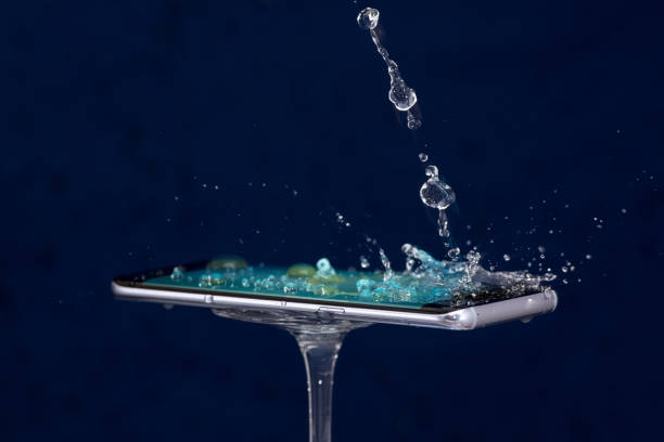 istock Mobile phone water resistant. Test waterproof mobile phone 1053309154