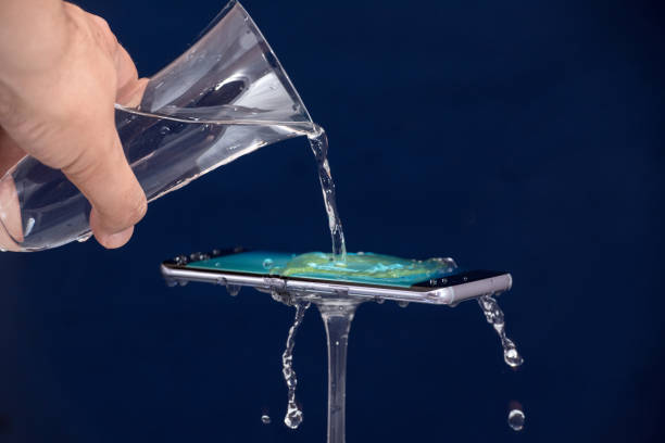istock Mobile phone water resistant. Test waterproof mobile phone 1053309278