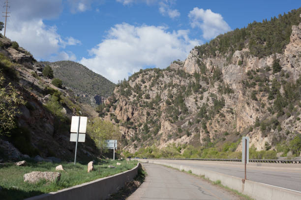 istock Highway Interstate 70 with bike path in Glenwood Canyon 1053312010