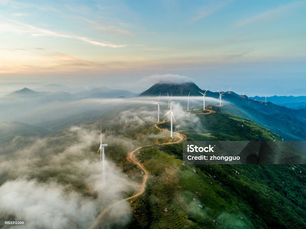 Wind power generation The wind field of the mountain ridge. High angle aerial photography. Sustainable Resources Stock Photo