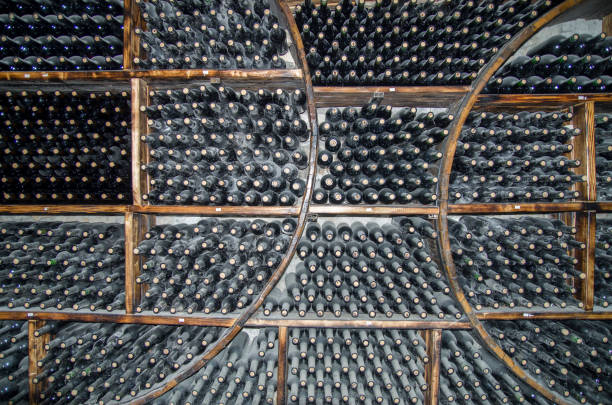 istock Wine cellar with many bottles of aging wine 1053315984