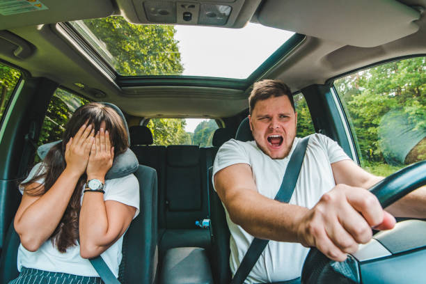 couple all most get car accident. not safe driving couple all most get car accident. not safe driving. insurance concept negative emotion stock pictures, royalty-free photos & images