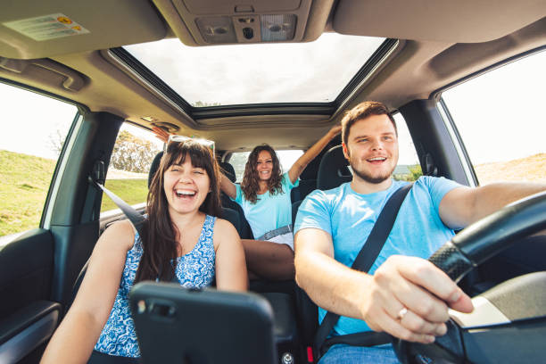 istock friends in car. road trip 1053329192