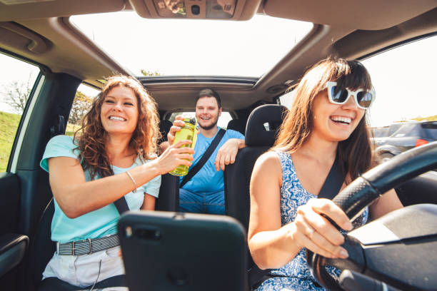 group of people travel by car. stock photo