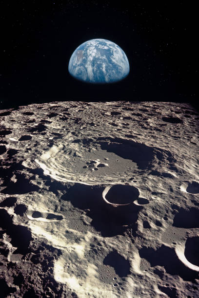 地球は月の地平線上に上昇します。 nasa から提供されたこのイメージの要素です。 - meteor crater ストックフォトと画像
