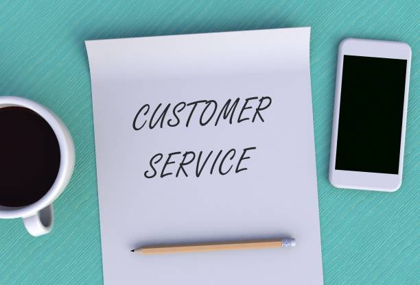 istock CUSTOMER SERVICE, message on paper, smart phone and coffee on table, 3D rendering 1053335554
