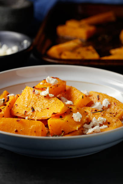 istock Roasted butternut squash with feta cheese 1053348892
