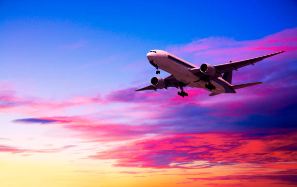 istock Commercial Aircraft in Sunset Sky 1053358034