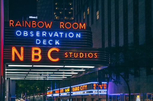 New York, New York, USA-September 16th, 2018: Sign for the Rainbow Room outside a newly renovated Rockefeller Center in mid town Manhattan.NBC Studio sign can be seen also.