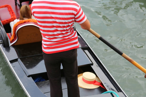istock gondolier on the gondola in Venice Italy 1053366040
