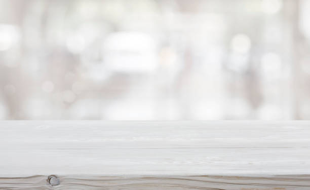 istock Abstract icy background and empty wooden table for product display 1053372418