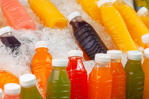 Fruit Juice Bottles in ice