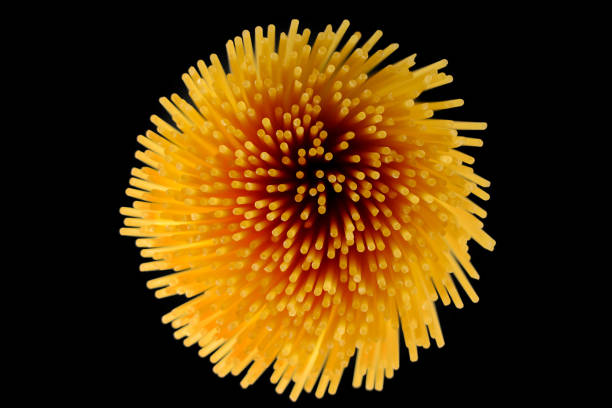 istock spaghetti in the form of fireworks on a black background isolate 1053376068
