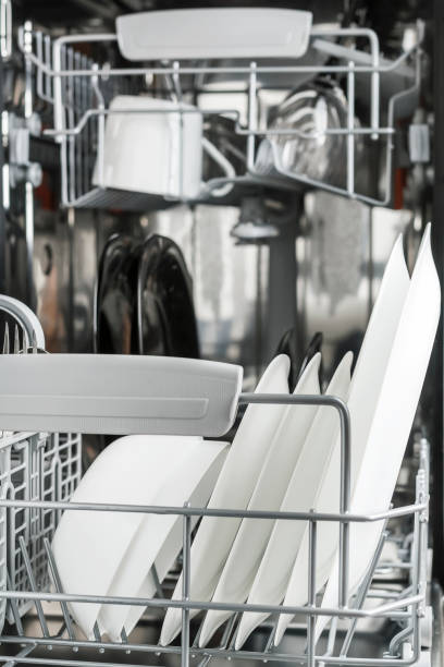 istock clean dishes in the dishwasher 1053376116