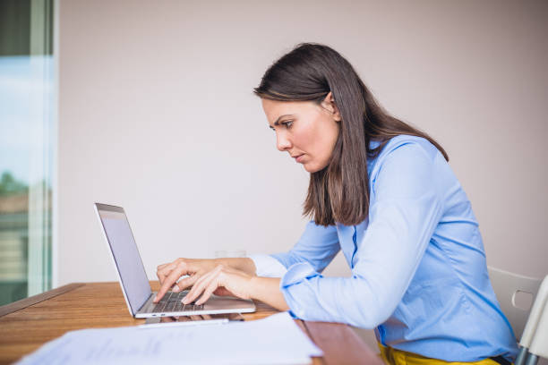 istock Young businesswomen working at cafe 1053376956