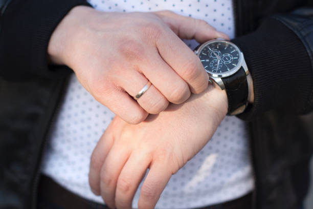 istock man wearing wristwatch 1053382226