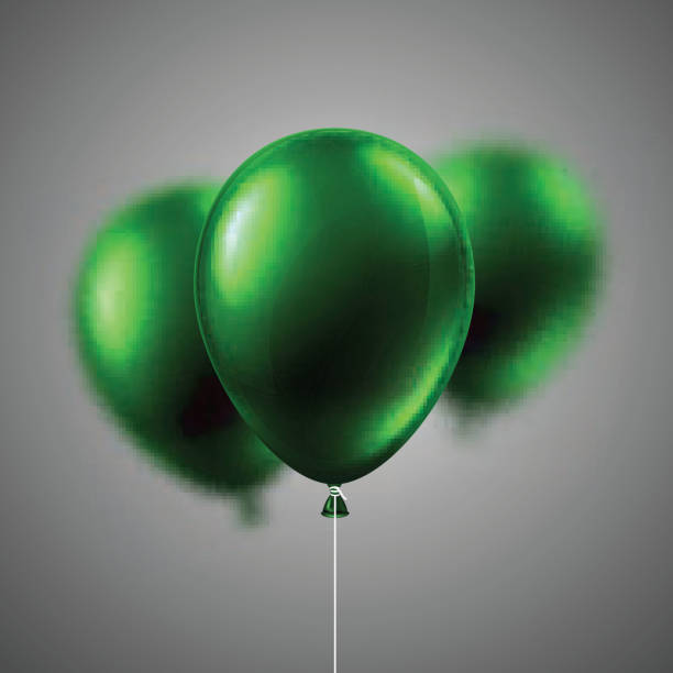 istock Green shiny balloons isolated on grey background. Festive decor. 1053387150