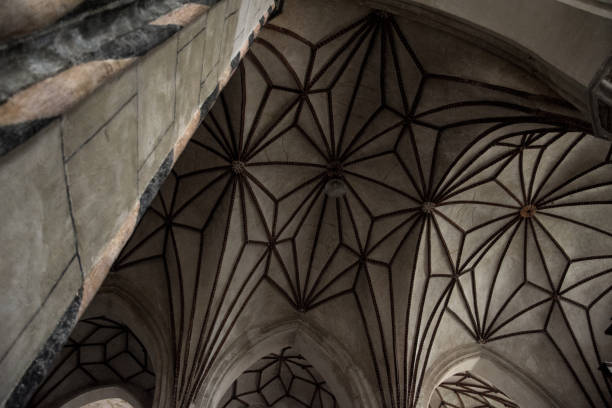 istock Gothic arches in a church 1053389660