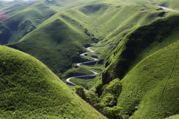 Winding road in Aso, Japan