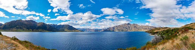 Lake pukaki panoramic reflection blue sky at sunny day, New Zealand.