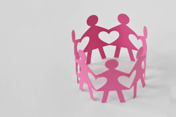 Women paper chain on white background - Love and unity concept