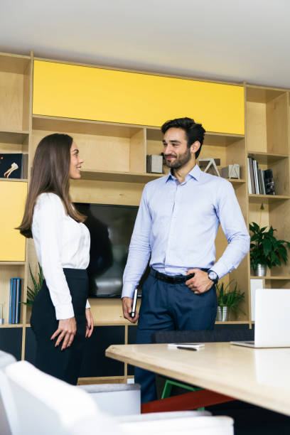 istock Young business people in modern office 1053400824