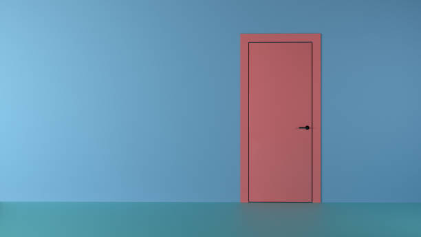 istock Minimal pastel colored room with a closed door on the right 1053406820