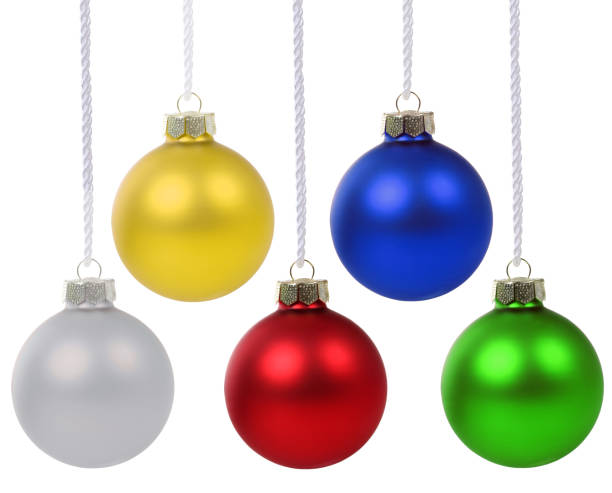 istock Christmas balls baubles colors hanging isolated on white 1053407524