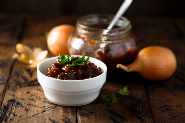 Onion jam Homemade onion and tomato jam chutney stock pictures, royalty-free photos & images
