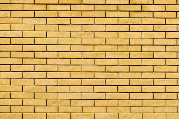 istock Close up of yellow brick wall 1053409688