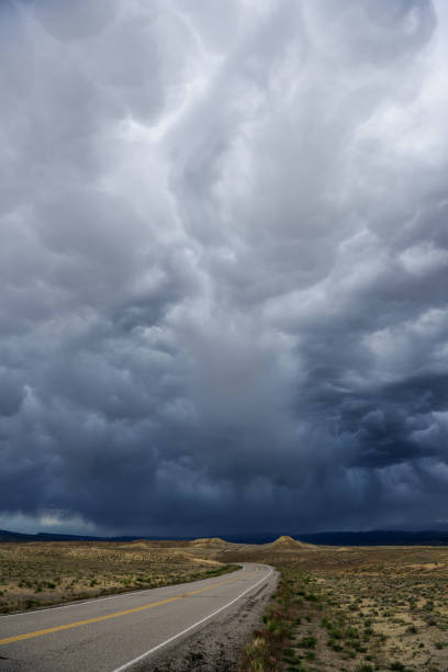 istock Utah road and incoming storm, panorama 1053416272