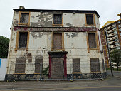 a collapsing fenced off derelict abandoned pub building in wakefield england