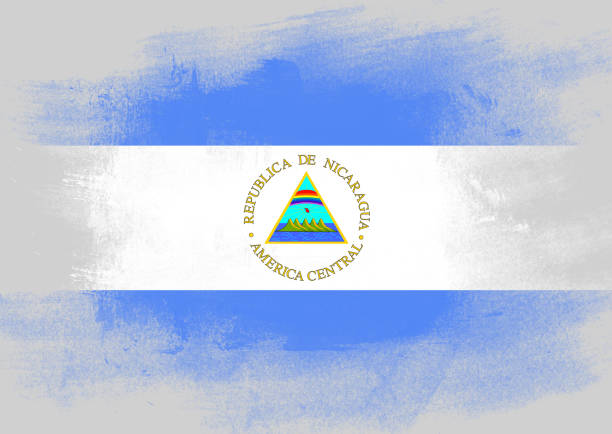 Flag of Nicaragua painted with brush on solid background,