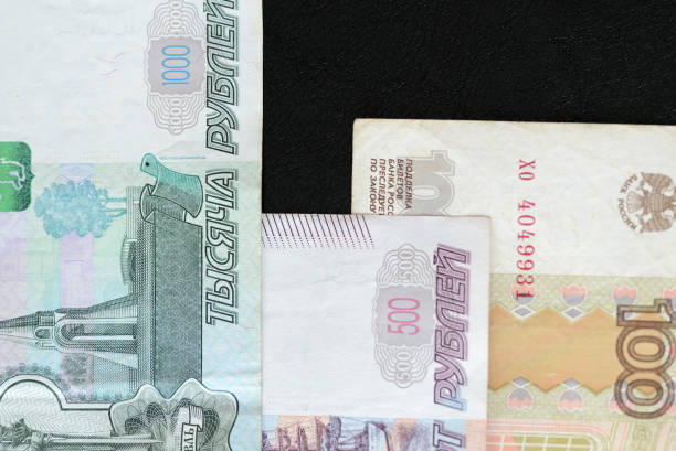 istock Banknote background from Russian rubles close up 1053434094