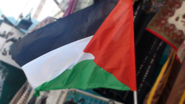 istock Palestine National Flag Waving View In Palestine 1053440968