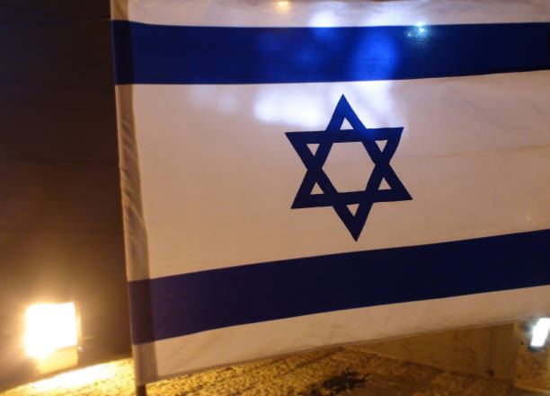 istock Looking At Israel National Flag In Jerusalem Israel 1053441014