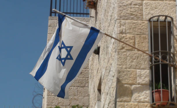 istock Israeli National Flag Waving In Jerusalem 1053441120