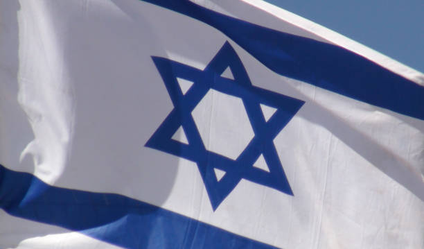 istock Israeli Flag Against Blue View In Jerusalem Israel 1053443618