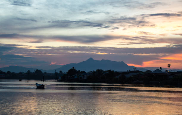 istock boat floating on a river in Kuching, Borneo 1053444234